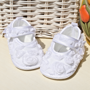 Scarpette bimba con roselline bianche