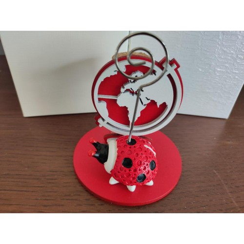 clip mappamondo con coccinella