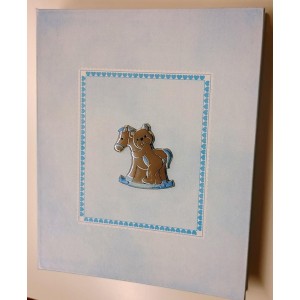 album celeste con cavallo a dondolo