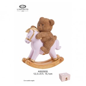 orsetto teddy su cavallo a dondolo