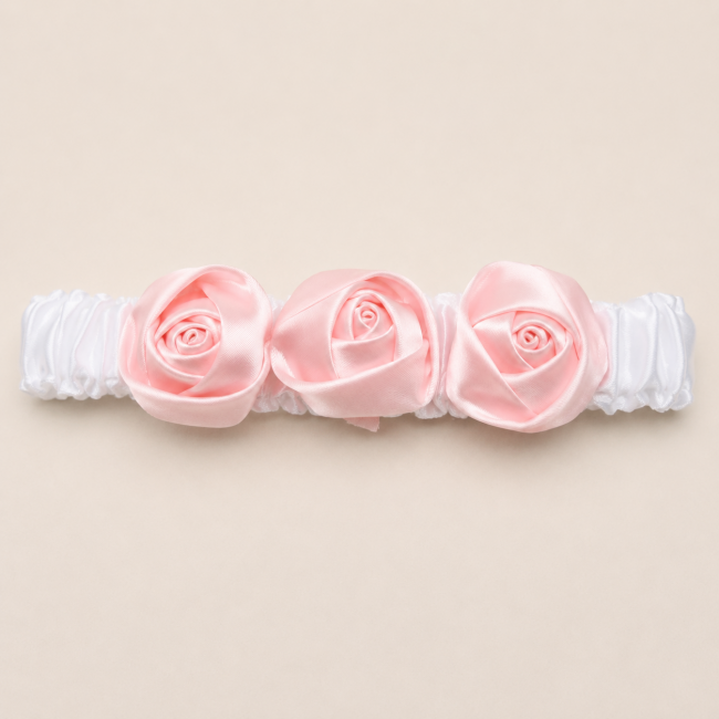 Fascia per capelli bianca con fiori rosa