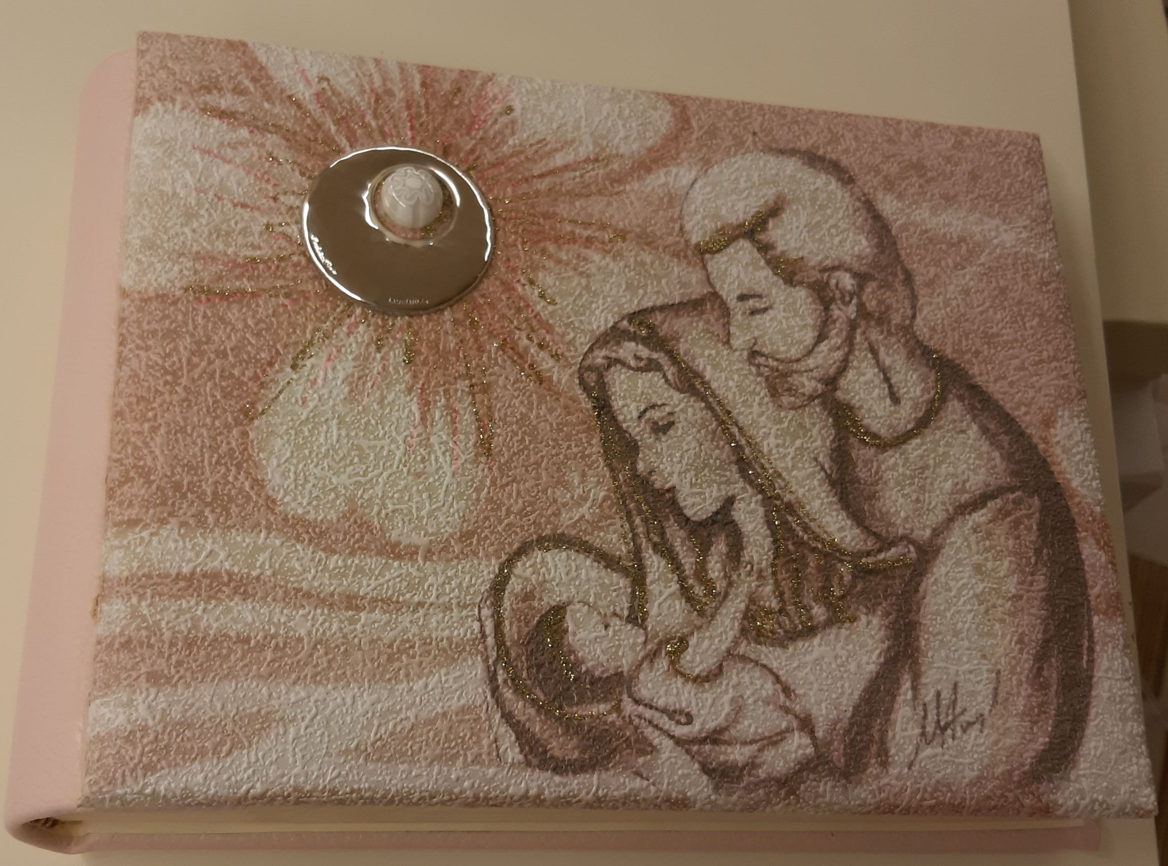 Album rosa con sacra famiglia