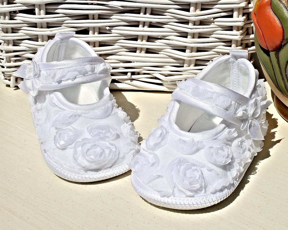 Scarpette bimba con roselline bianche Scarpette bimba con roselline bianche