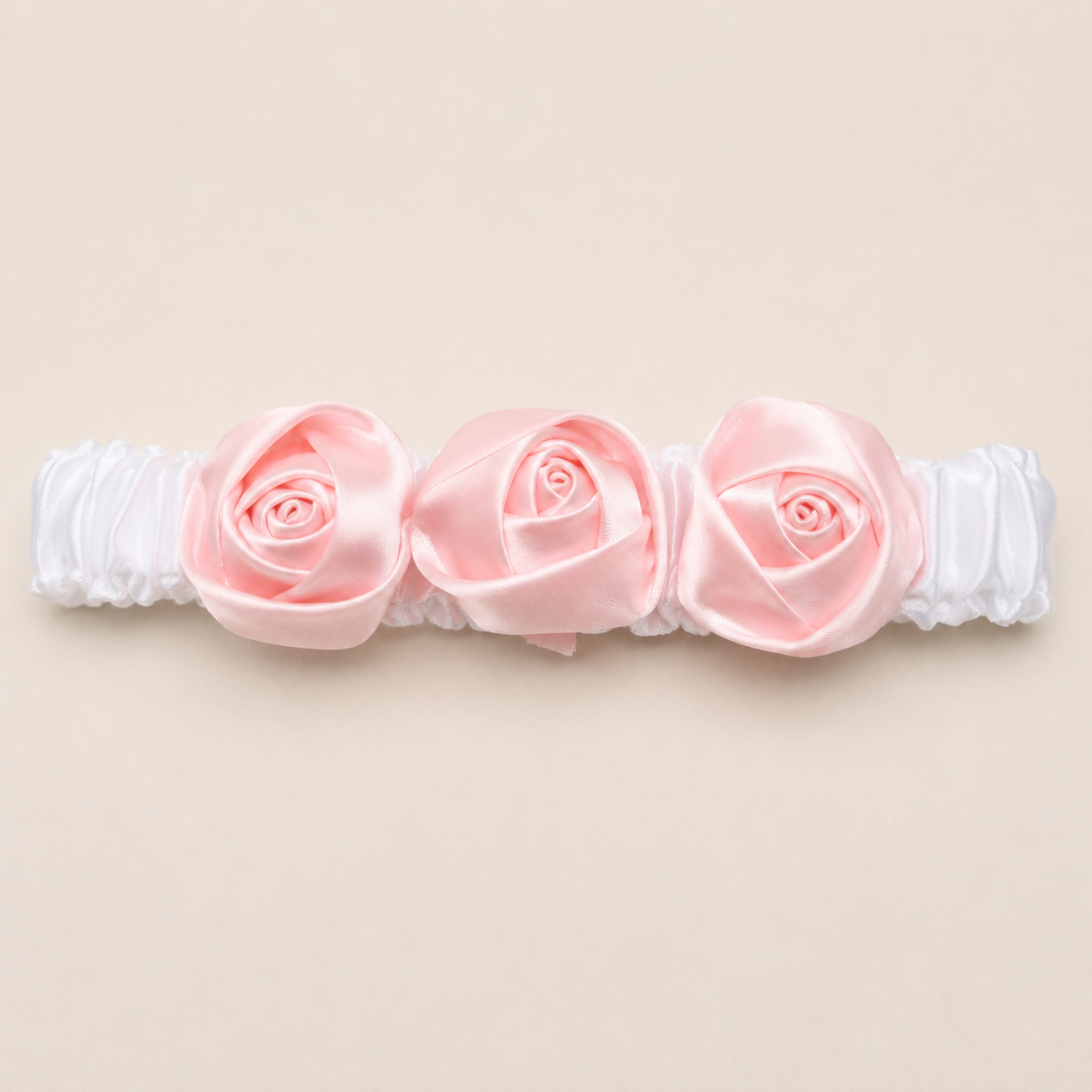 Fascia per capelli bianca con fiori rosa