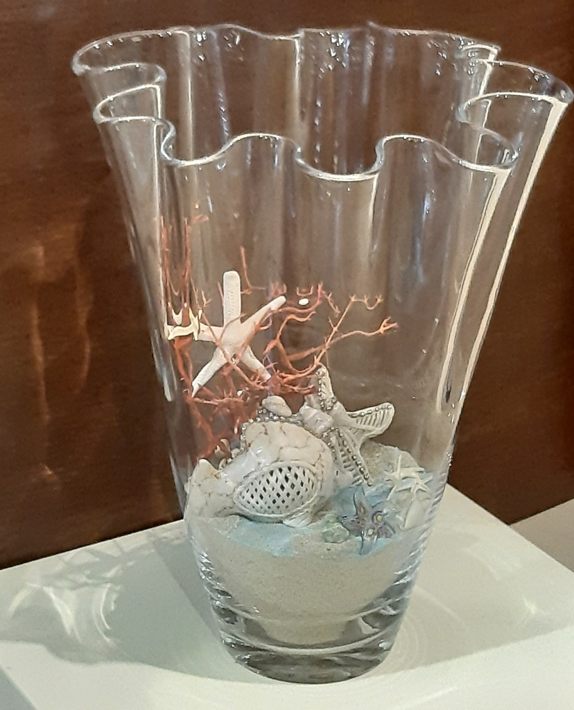Vaso onde con conchiglie stella e pesci mare Vaso onde con conchiglie stella e pesci mare