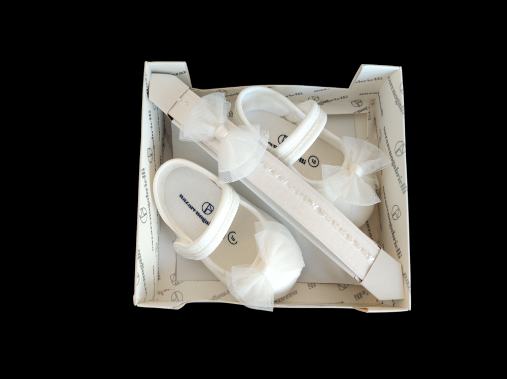 Scarpe e fascia abbinata con fiocco Scarpe e fascia abbinata con fiocco